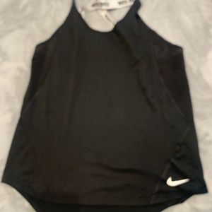 Two Nike cross back tanks